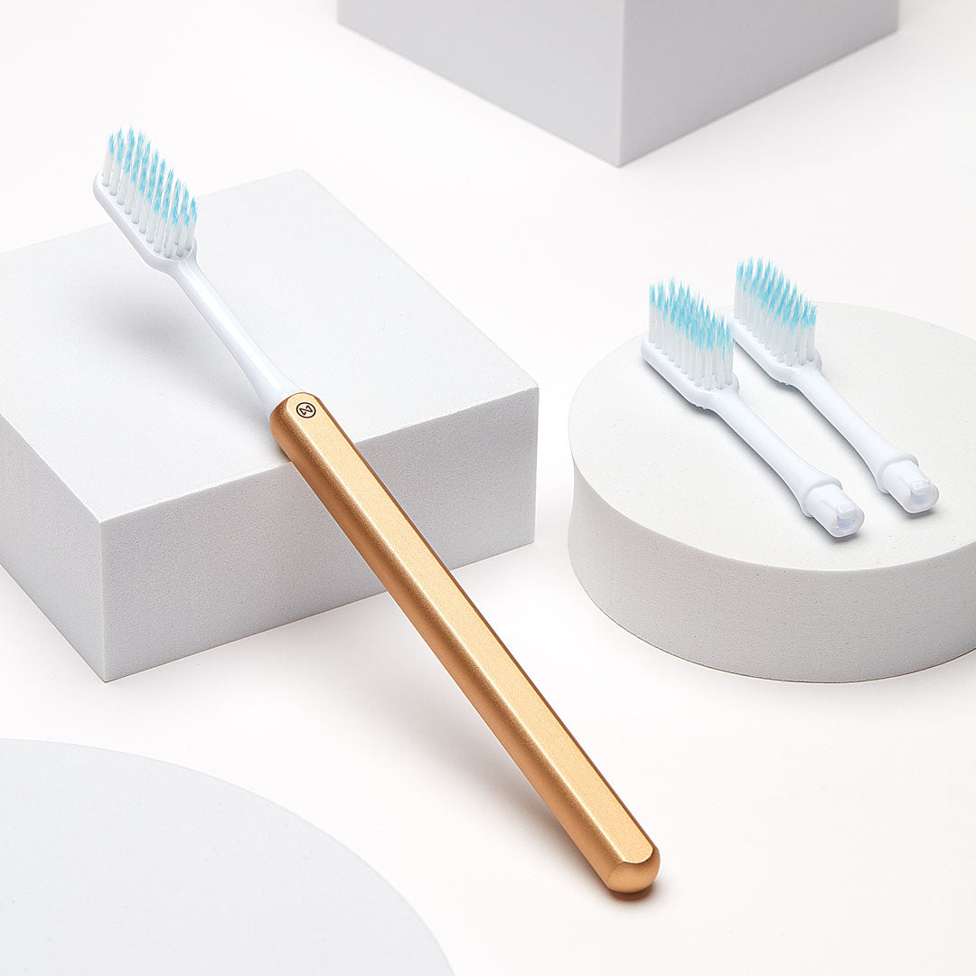 Nada Gold Toothbrush + 2 brush heads