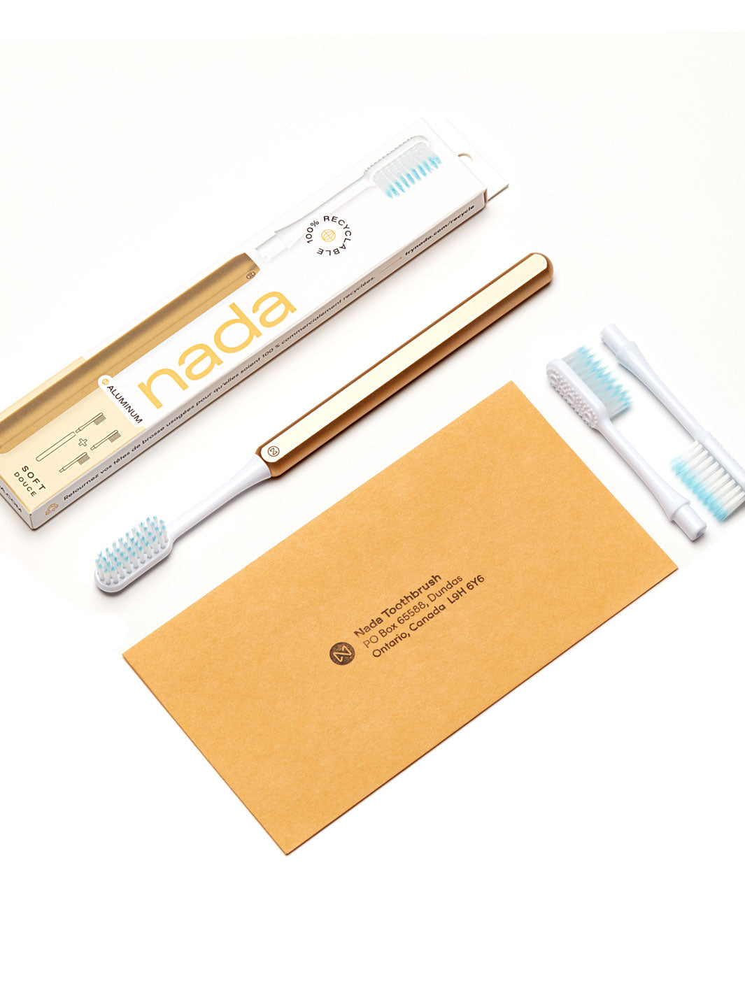 Nada Gold Toothbrush + 2 brush heads