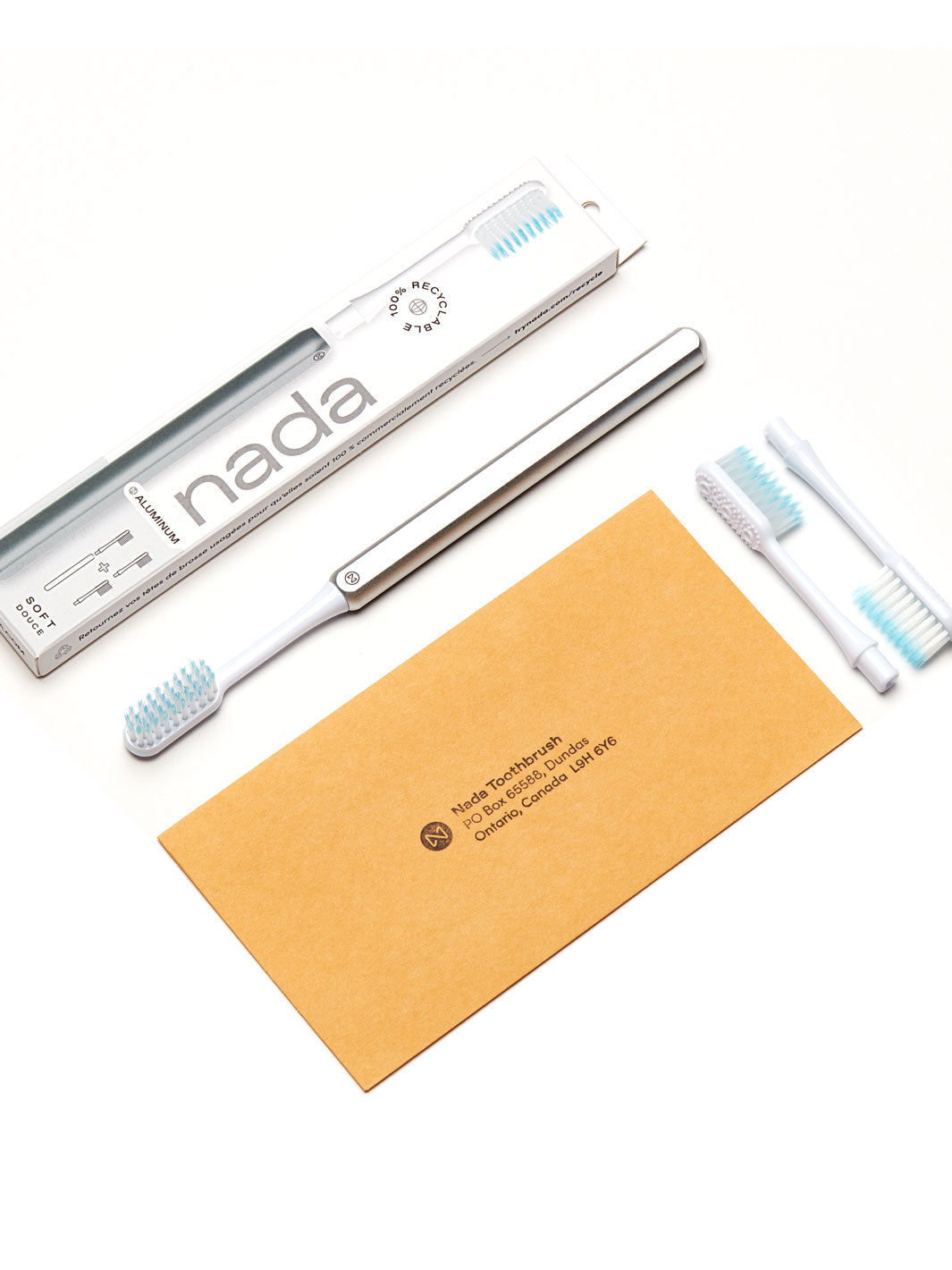 Nada Silver Toothbrush + 2 brush heads