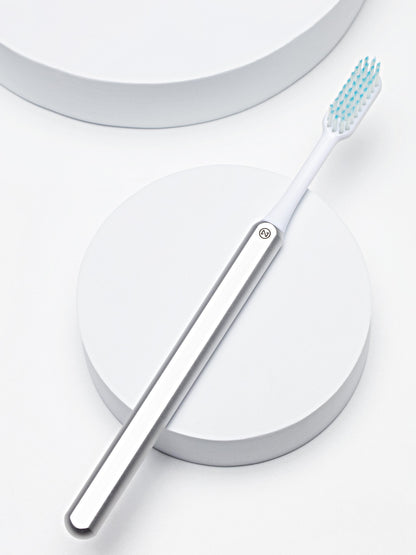 Nada Silver Toothbrush + 2 brush heads